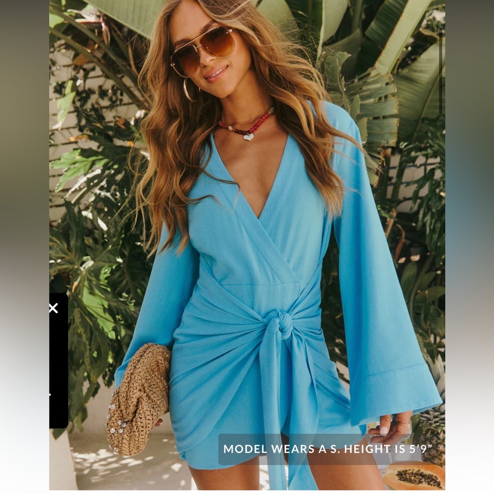 NWT’s Vici Sunny Somewhere wrap dress.  Small